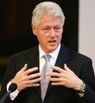 Bill Clinton is the master of the "intimate gesture," which helps him connect to his audience members.